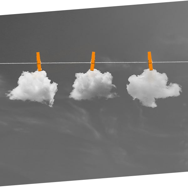 Three clouds pegged onto a washing line