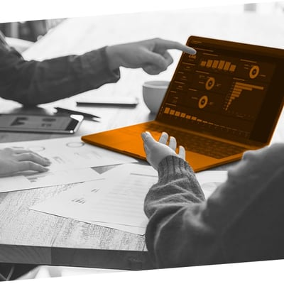 Close up of a group analysing a dashboard