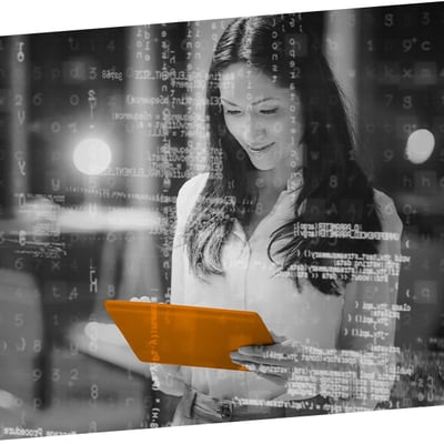 Woman using Tablet computer with Data overlay